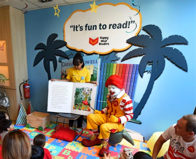 Ronald McDonald conducting a storytelling session at McDonald’s Marine Cove